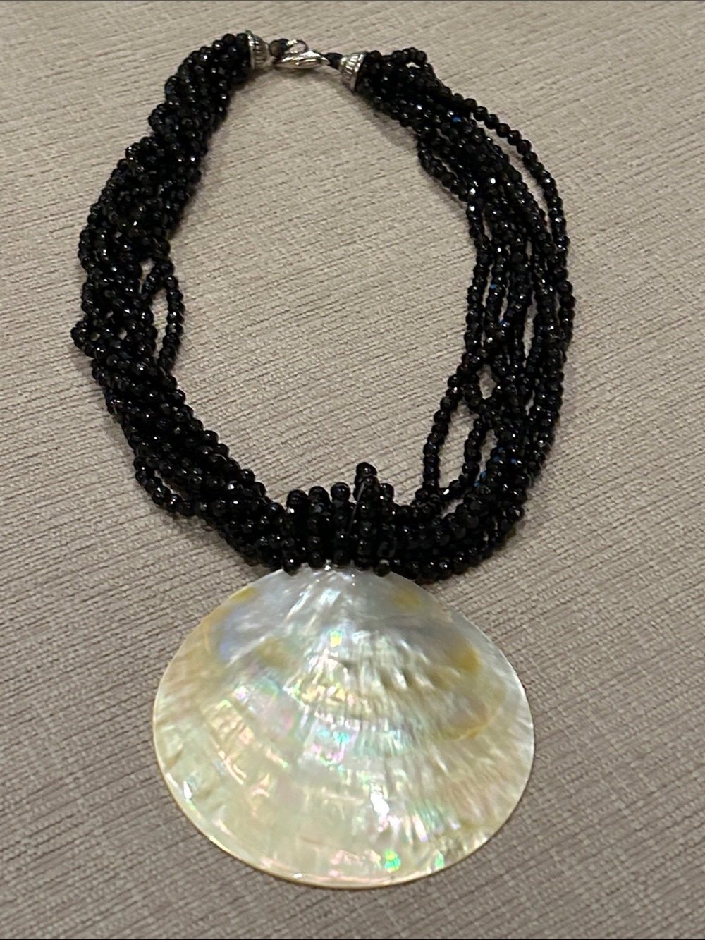 Black Multi-Strand Beaded Necklace with large Iridescent Mother-of-Pearl Pendant